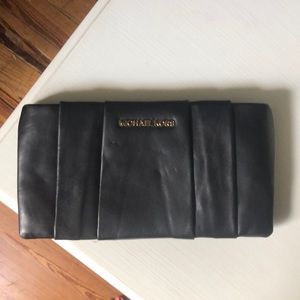Michael Kors | black leather clutch
